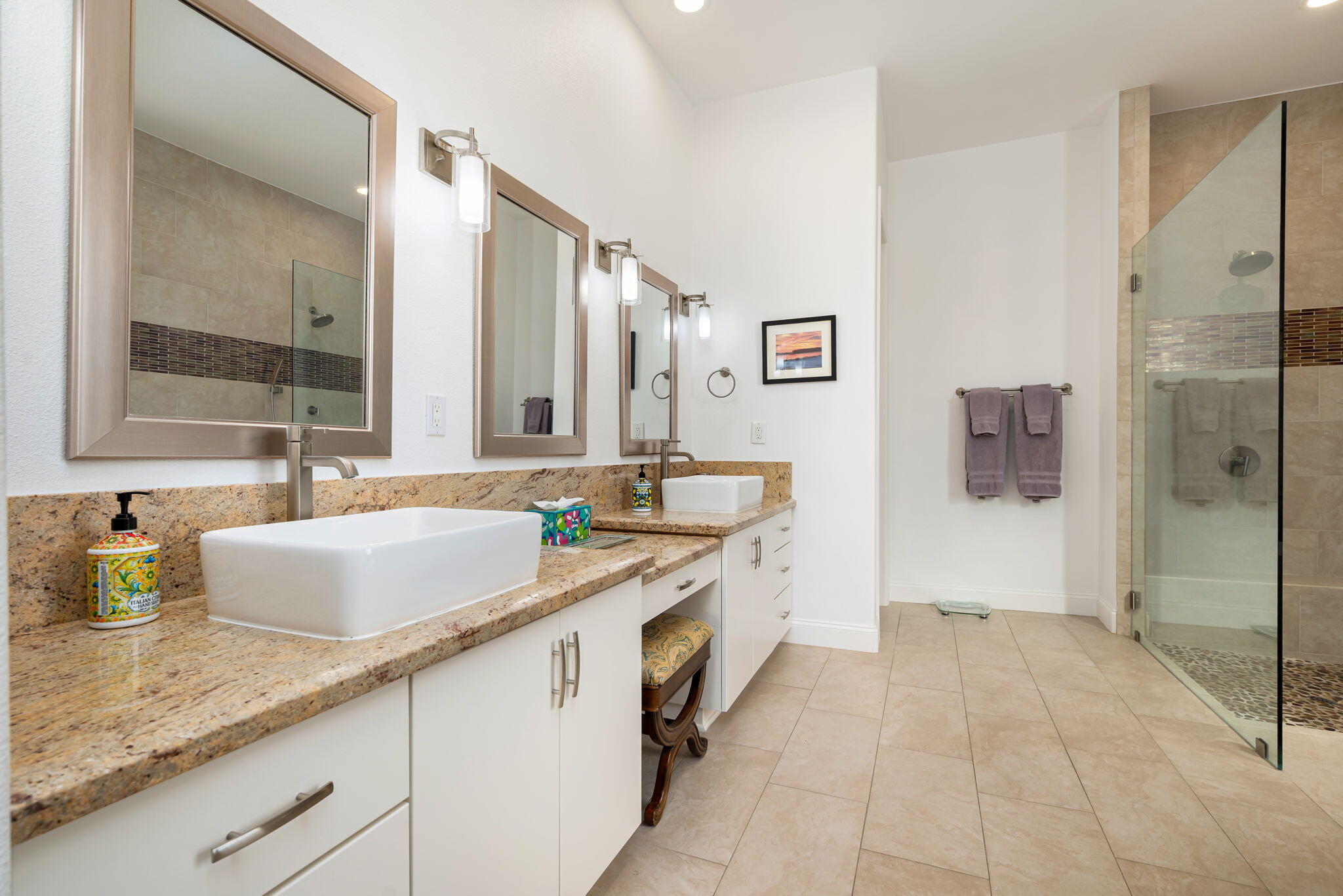 46 Vía Bella Rancho Mirage, CA 92270 - Photo 11 of 28 a spacious bathroom with a granite countertop sink and a mirror