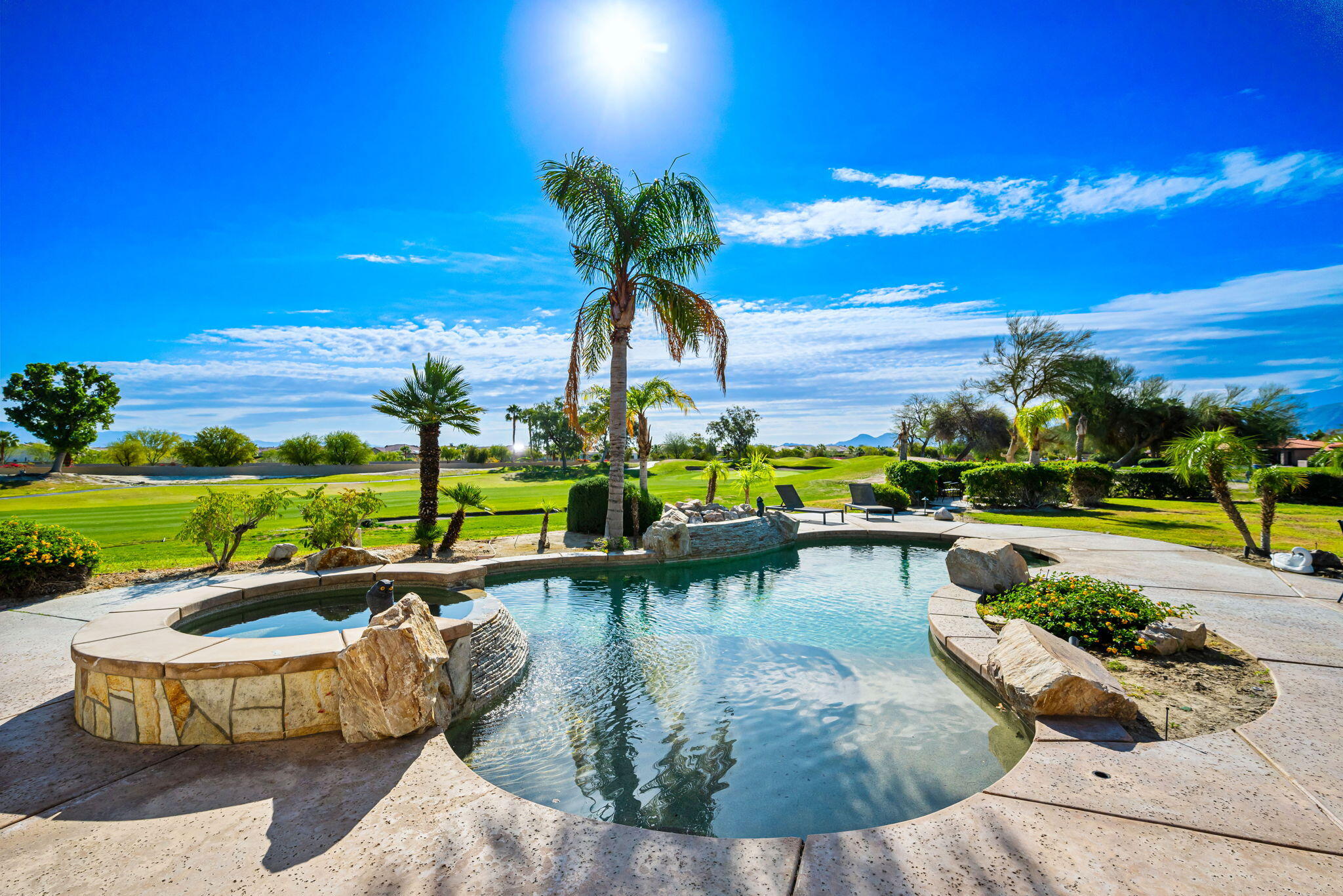 46 Vía Bella Rancho Mirage, CA 92270 - Photo 28 of 28 a view of a swimming pool with a patio
