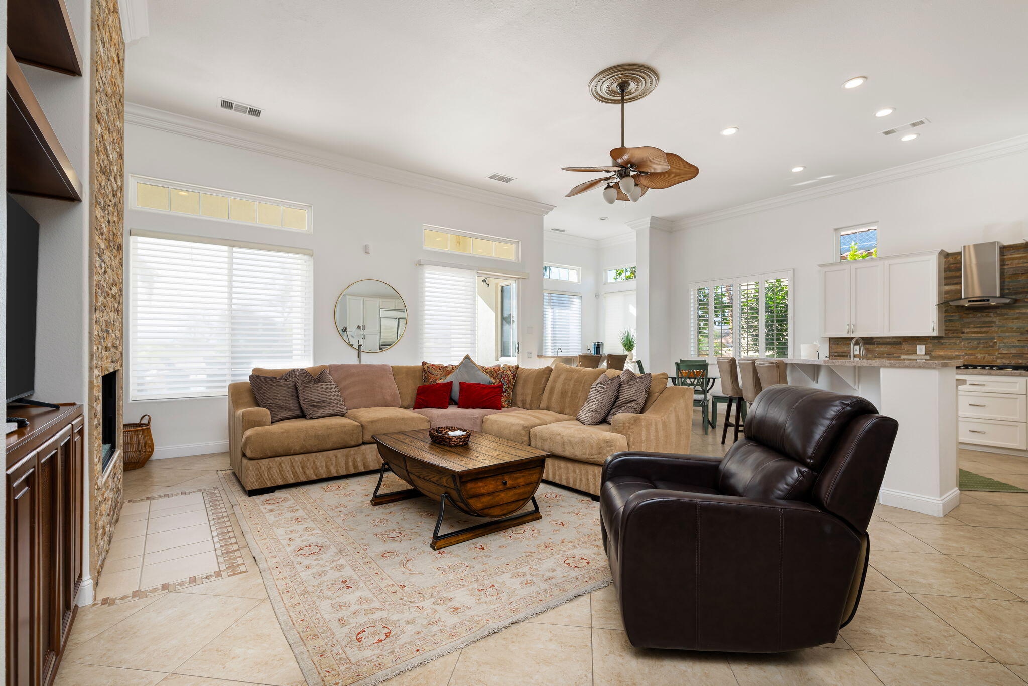 46 Vía Bella Rancho Mirage, CA 92270 - Photo 5 of 28 a living room with furniture and a chandelier