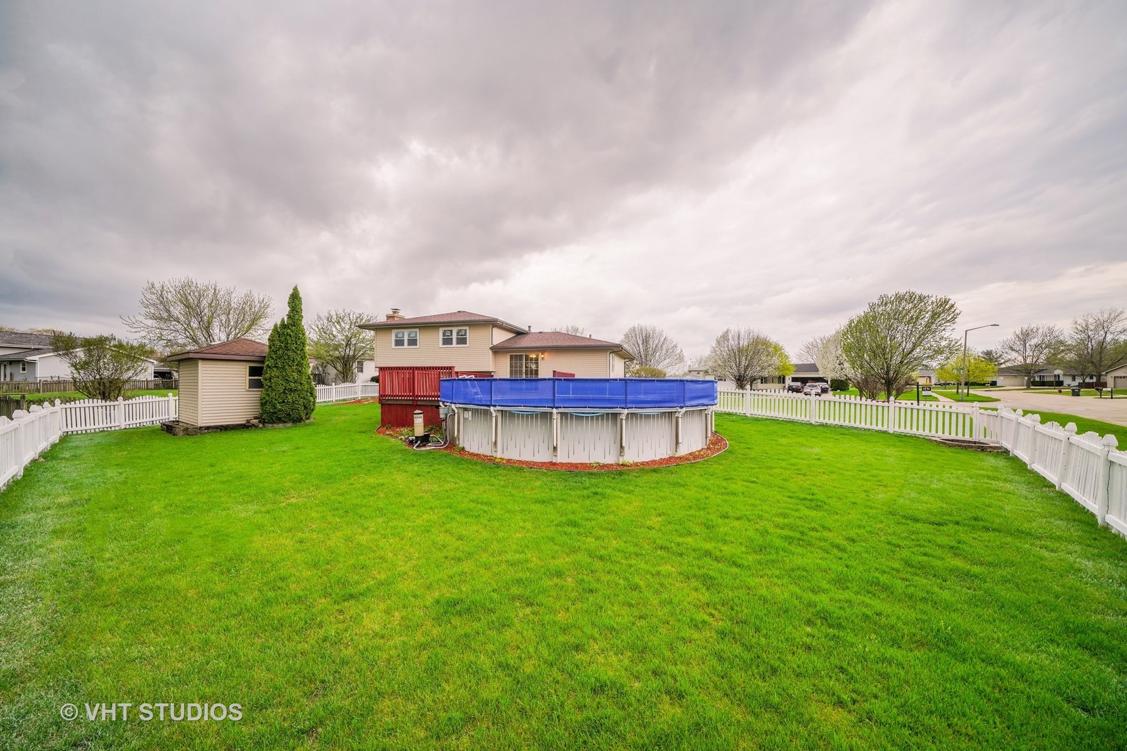 904 Knollside Road New Lenox, IL 60451 - Photo 12 of 16 a yard with lots of green space and deers