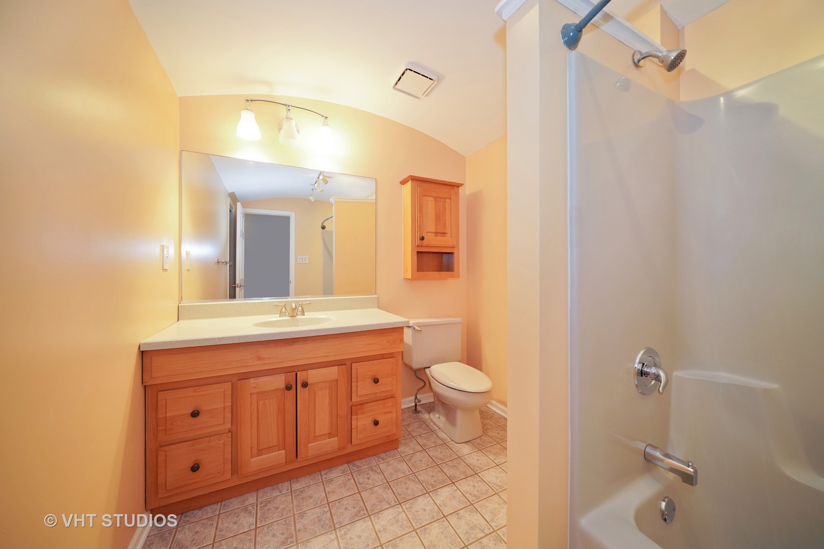 904 Knollside Road New Lenox, IL 60451 - Photo 9 of 16 a spacious bathroom with a granite countertop sink toilet and shower