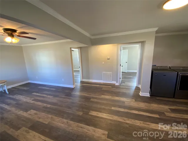 a view of a room with an empty space