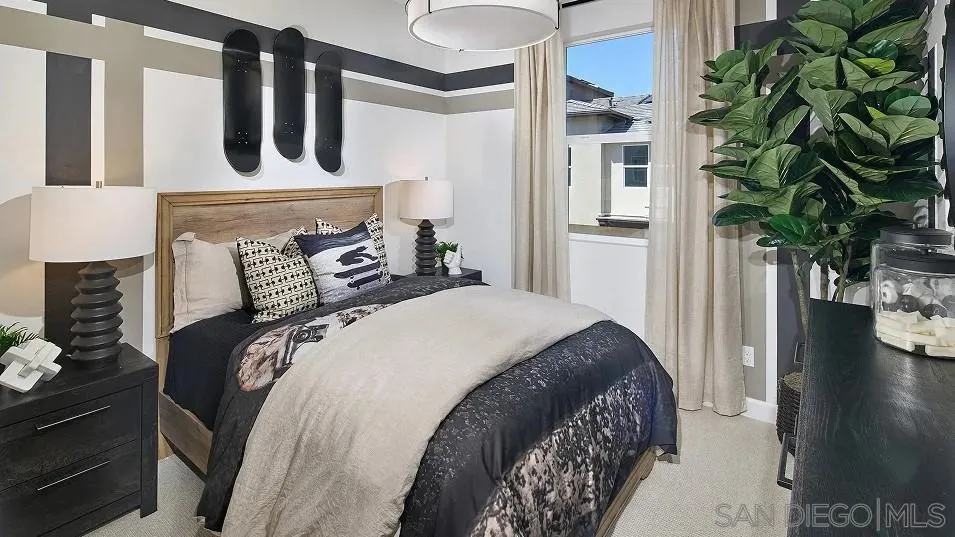 324 Beaker Road San Marcos, CA 92078 - Photo 12 of 19 a bedroom with a large bed and a potted plant