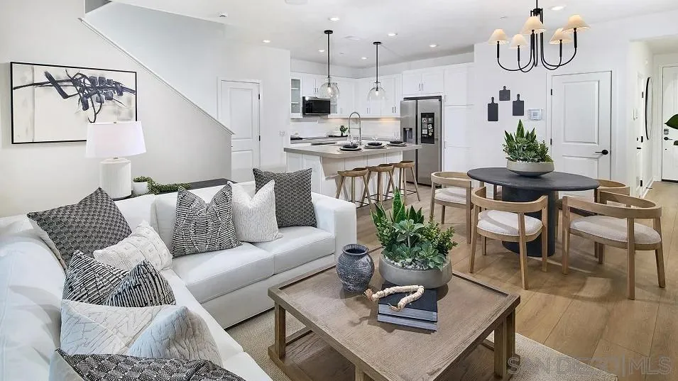324 Beaker Road San Marcos, CA 92078 - Photo 4 of 19 a living room with furniture kitchen view and a chandelier