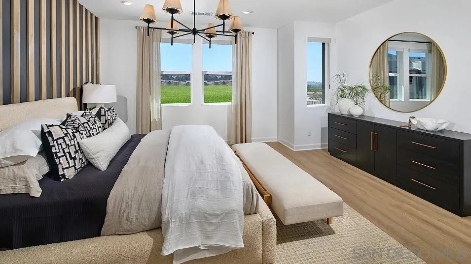 324 Beaker Road San Marcos, CA 92078 - Photo 8 of 19 a bedroom with a bed mirror on desk and a window