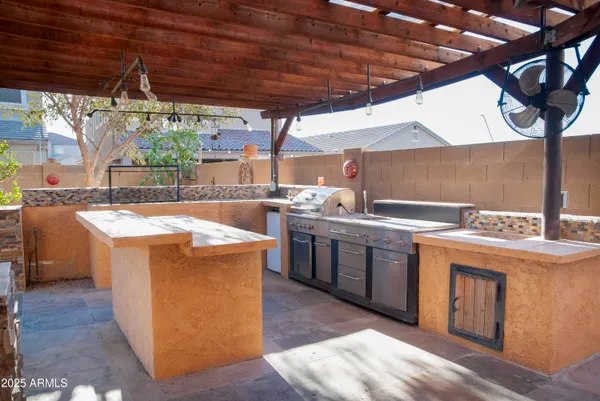 a view of a kitchen with storage and utility