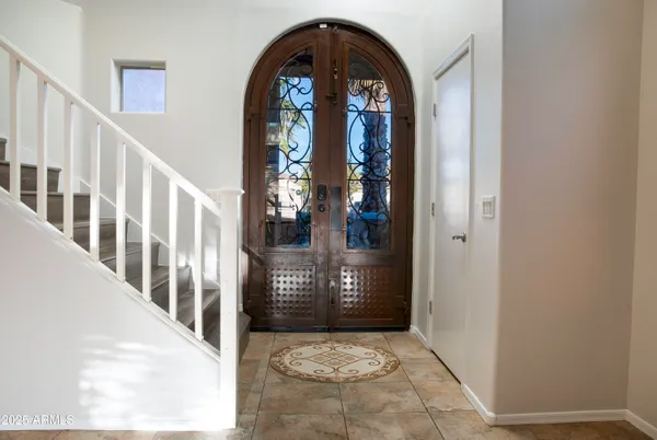 a view of entryway with a front door