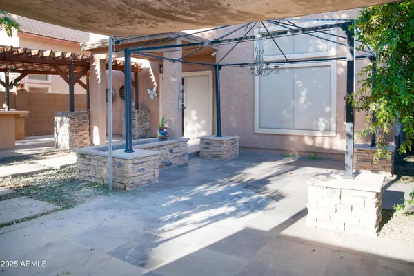 a view of a street with chairs