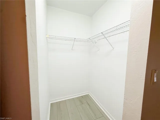 a view of a room with racks on the wall