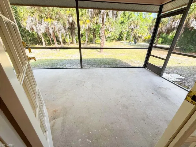 a view of a large window with an outdoor space