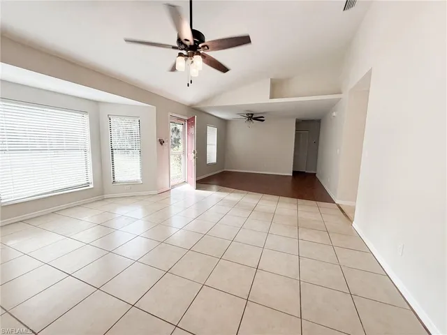a view of an empty room and window