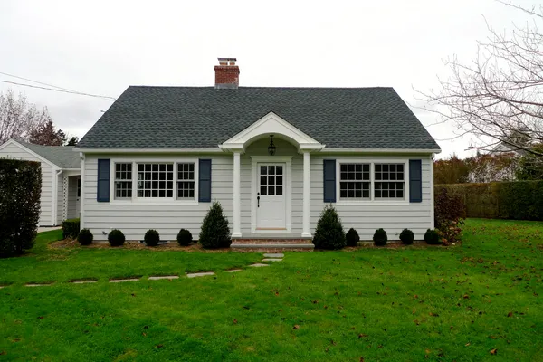 a big house with a big yard and more windows