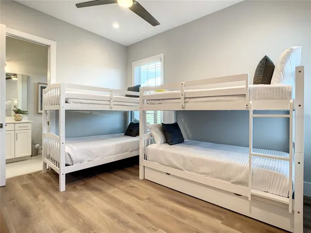 a bedroom with a bed and a cabinets