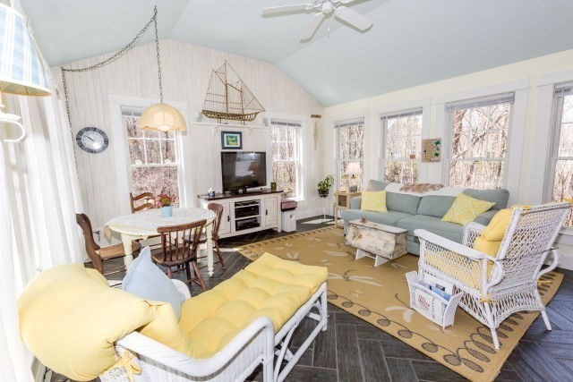 140 Warren Street Upton, MA 01568 - Photo 13 of 37 a living room with fireplace furniture and a flat screen tv