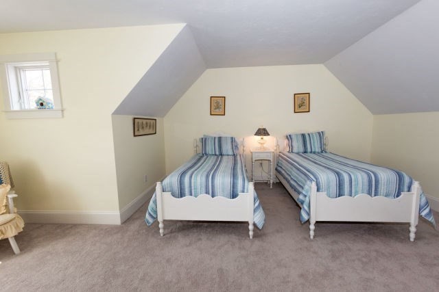 140 Warren Street Upton, MA 01568 - Photo 26 of 37 a bedroom with two beds and painted walls