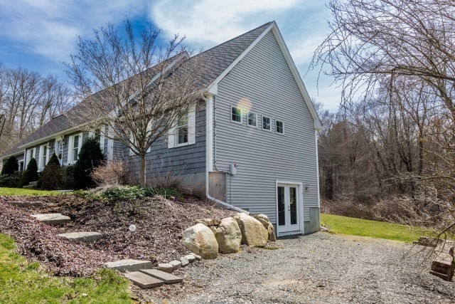 140 Warren Street Upton, MA 01568 - Photo 30 of 37 a view of a house with a yard