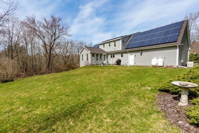 140 Warren Street Upton, MA 01568 - Photo 32 of 37 a view of a house with a big yard and large tree