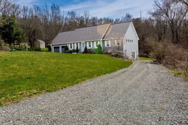 140 Warren Street Upton, MA 01568 - Photo 35 of 37 a view of house with garden