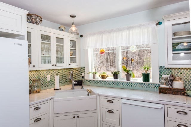 140 Warren Street Upton, MA 01568 - Photo 5 of 37 a kitchen with a sink and a window