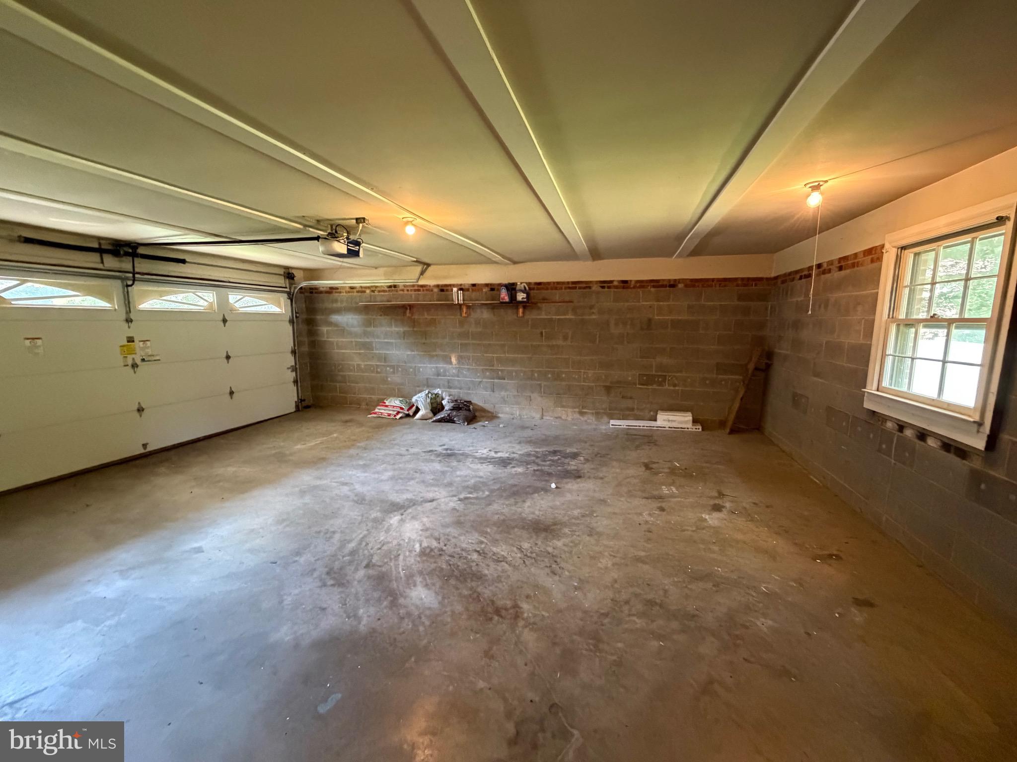 7216 Reservation Drive Springfield, VA 22153 - Photo 18 of 44 Two Car Garage Walk into Informal Living Room