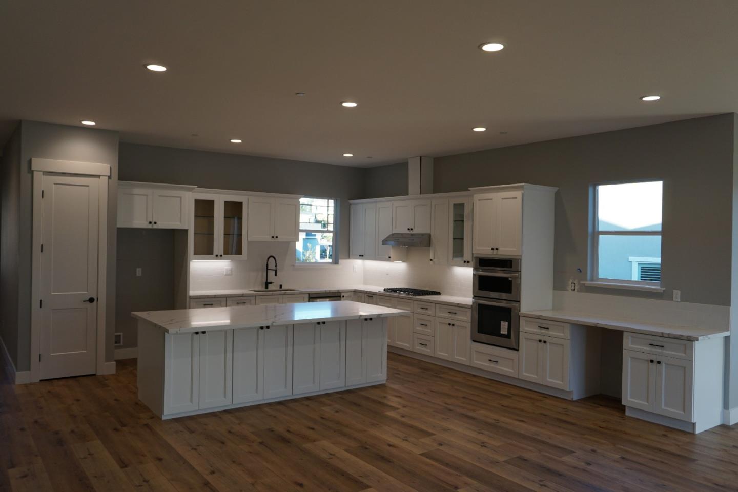 3952 Millbrook Drive Santa Rosa, CA 95404 - Photo 3 of 11 a large kitchen with stainless steel appliances granite countertop a large counter top and a stove top oven