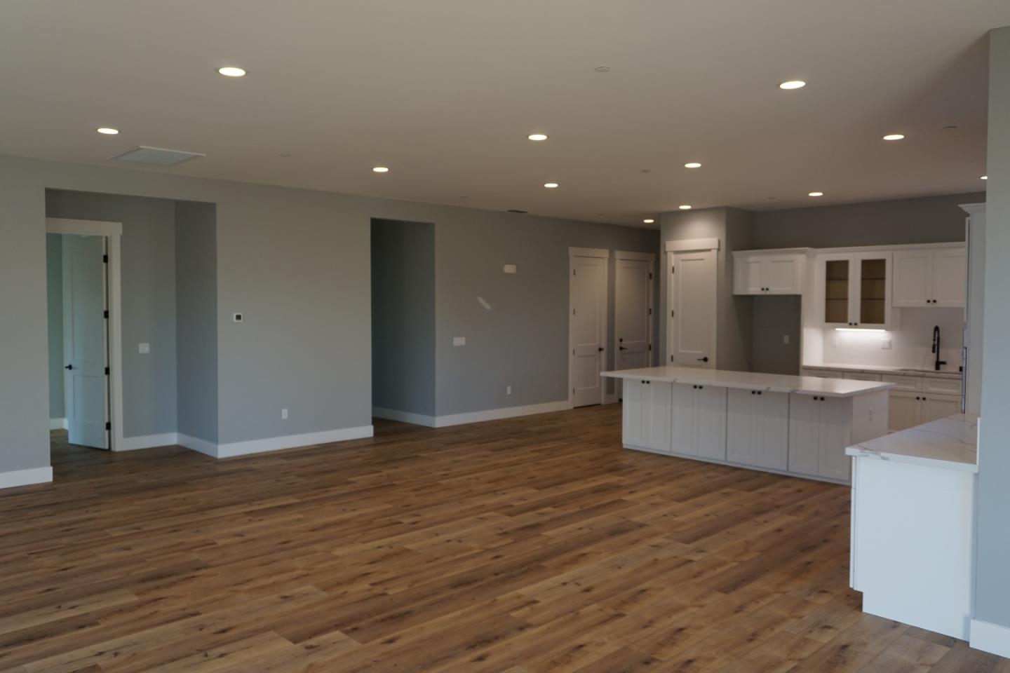 3952 Millbrook Drive Santa Rosa, CA 95404 - Photo 8 of 11 a large kitchen with stainless steel appliances granite countertop a large counter top a sink and a refrigerator