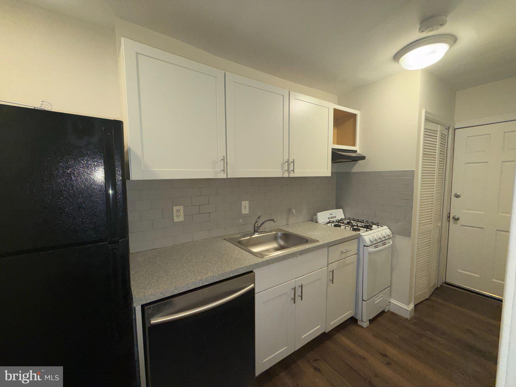 102 O Street Southwest, Unit 1 Washington, DC 20024 - Photo 9 of 18 Modern kitchen with sleek finishes.