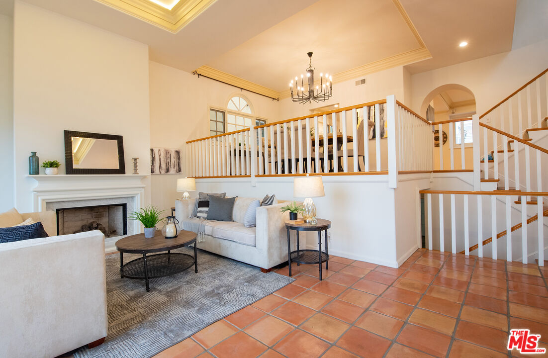 115 Roma Court Marina del Rey, CA 90292 - Photo 12 of 50 a view of a livingroom with furniture & staircase