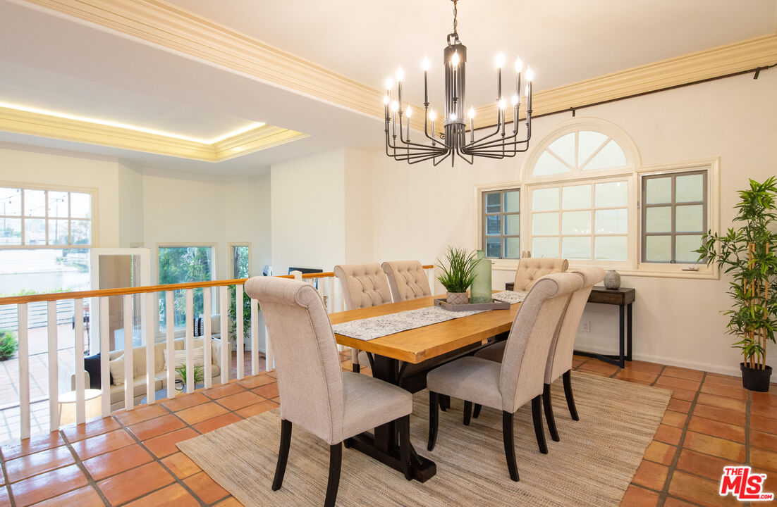 115 Roma Court Marina del Rey, CA 90292 - Photo 14 of 50 a view of a dining room with furniture window and wooden floor