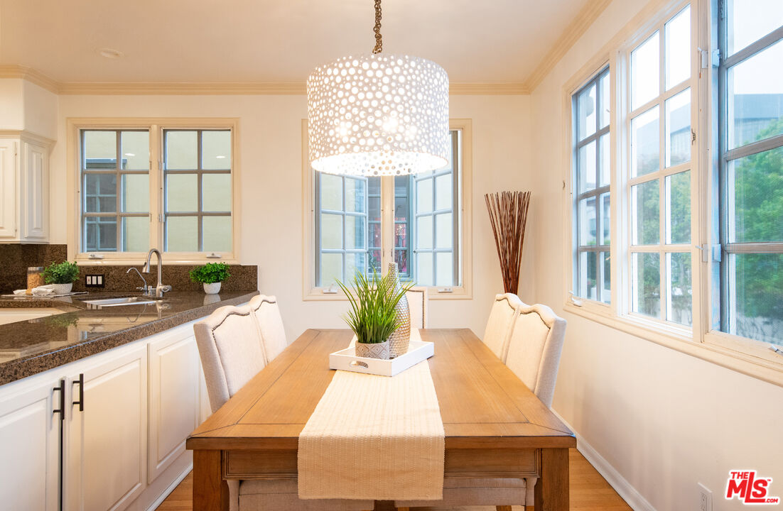 115 Roma Court Marina del Rey, CA 90292 - Photo 18 of 50 a view of a kitchen with granite countertop a sink and a window