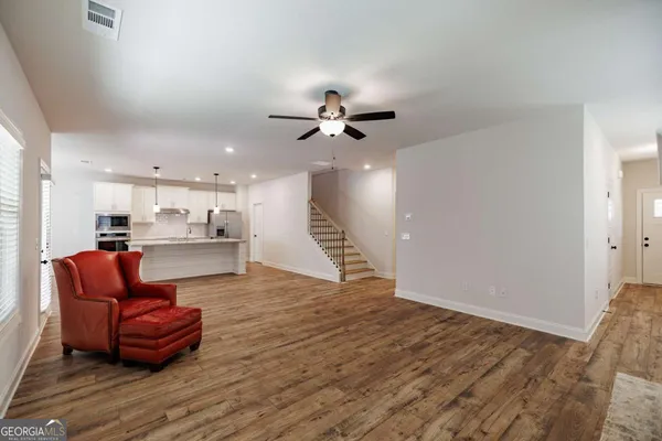 a bedroom with a bed and a cabinets