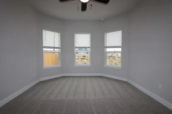a spacious bathroom with a double vanity sink a mirror and a bathtub