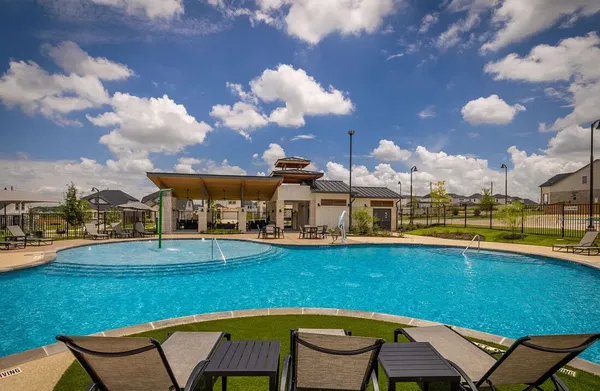 a view of a swimming pool and outdoor space