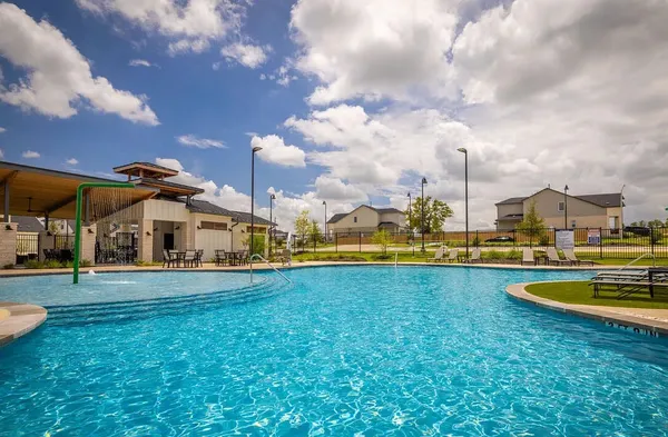 a view of a park with a slide