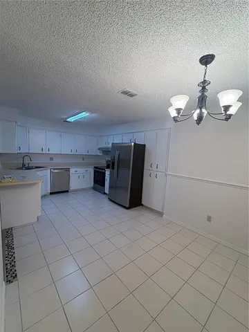 a kitchen with a cabinets and counter space