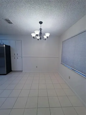 a view of a livingroom with a chandelier