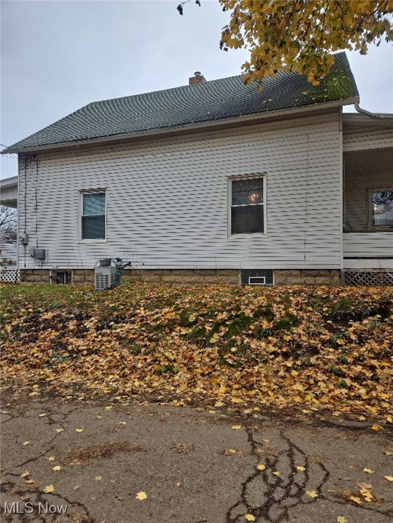 3140 12th Street Northwest Canton, OH 44708 - Photo 2 of 13 View of side of home with central AC