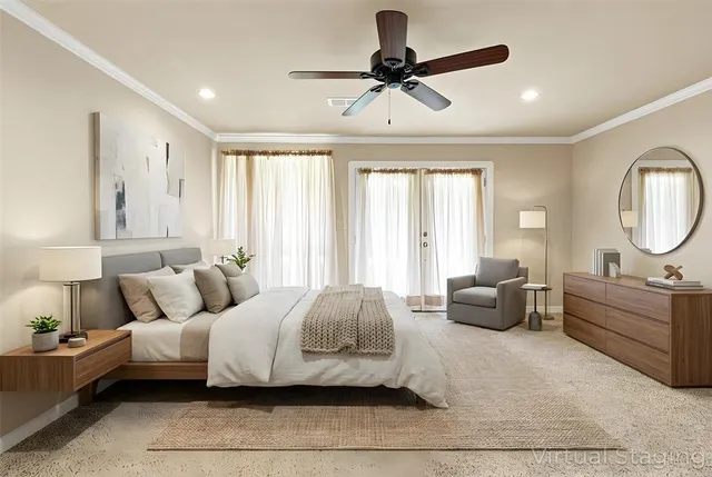 a bedroom with a bed couch and window