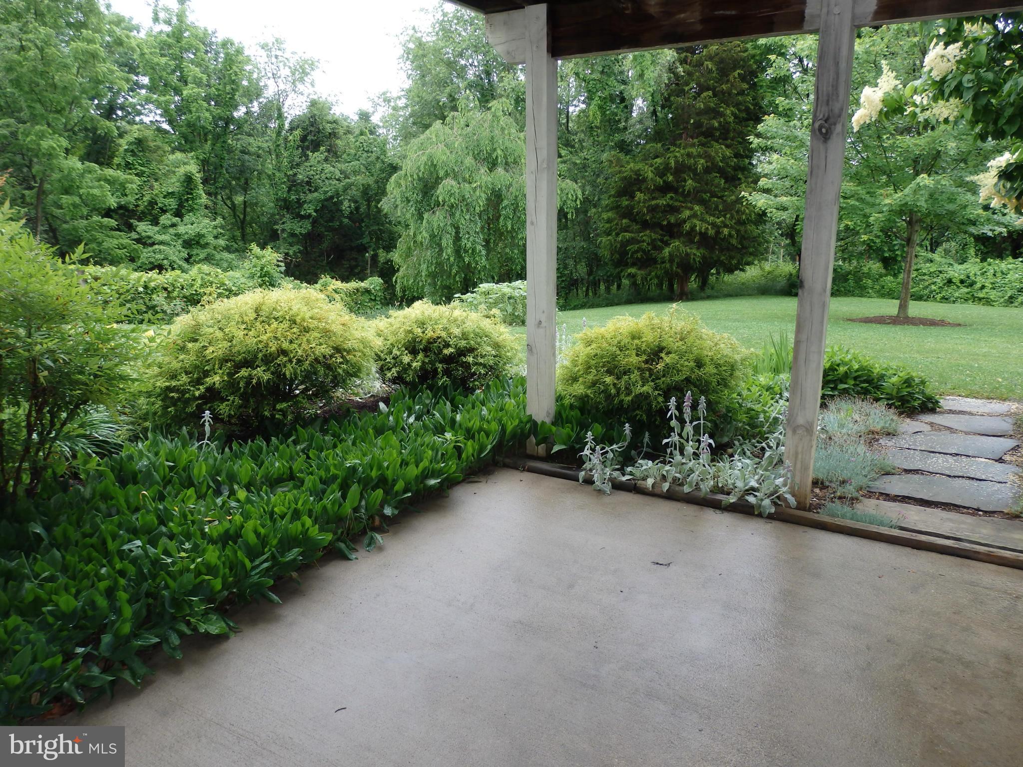 10013 Kelly Road Frederick, MD 21701 - Photo 23 of 23 Patio surrounded by professional landscaping
