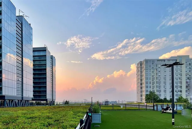 a view of a city with tall buildings