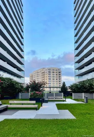 a view of a city in front of a building