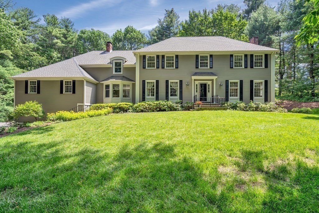 1031 Boston Post Road Sudbury, MA 01776 - Photo 1 of 36 a front view of a house with a yard