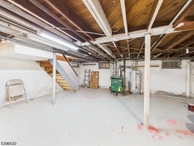 a backyard of a house with yard and outdoor seating