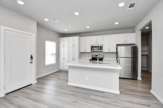 a view of a swimming pool with outdoor seating