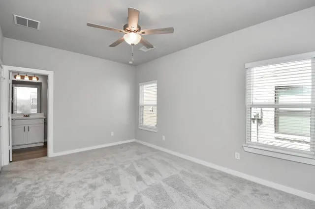 a swimming pool with outdoor seating and yard