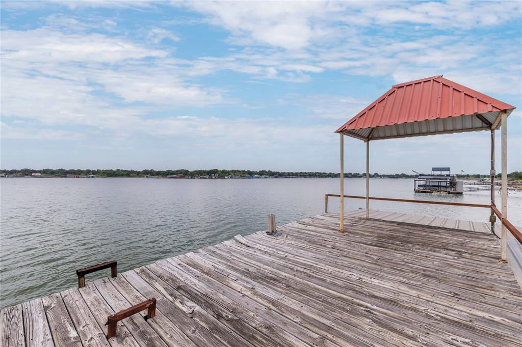 977 Deep Water Road May, TX 76857 - Photo 19 of 36 a house view with a lake view