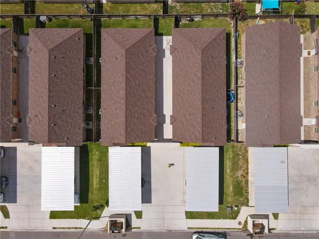 a view of a street with sitting area