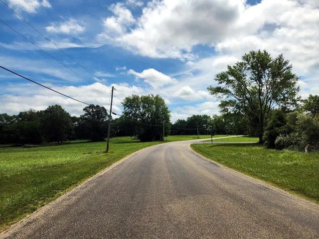 a view of a park and entertaining space