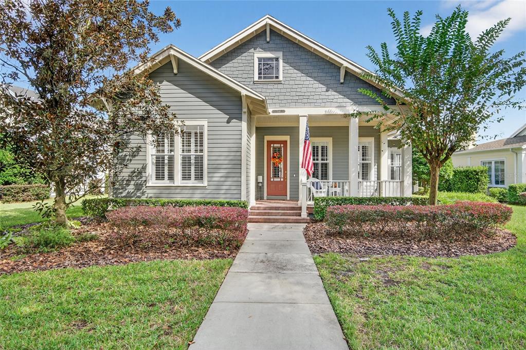 1164 Wilde Drive Celebration, FL 34747 - Photo 1 of 1 a front view of a house with a garden