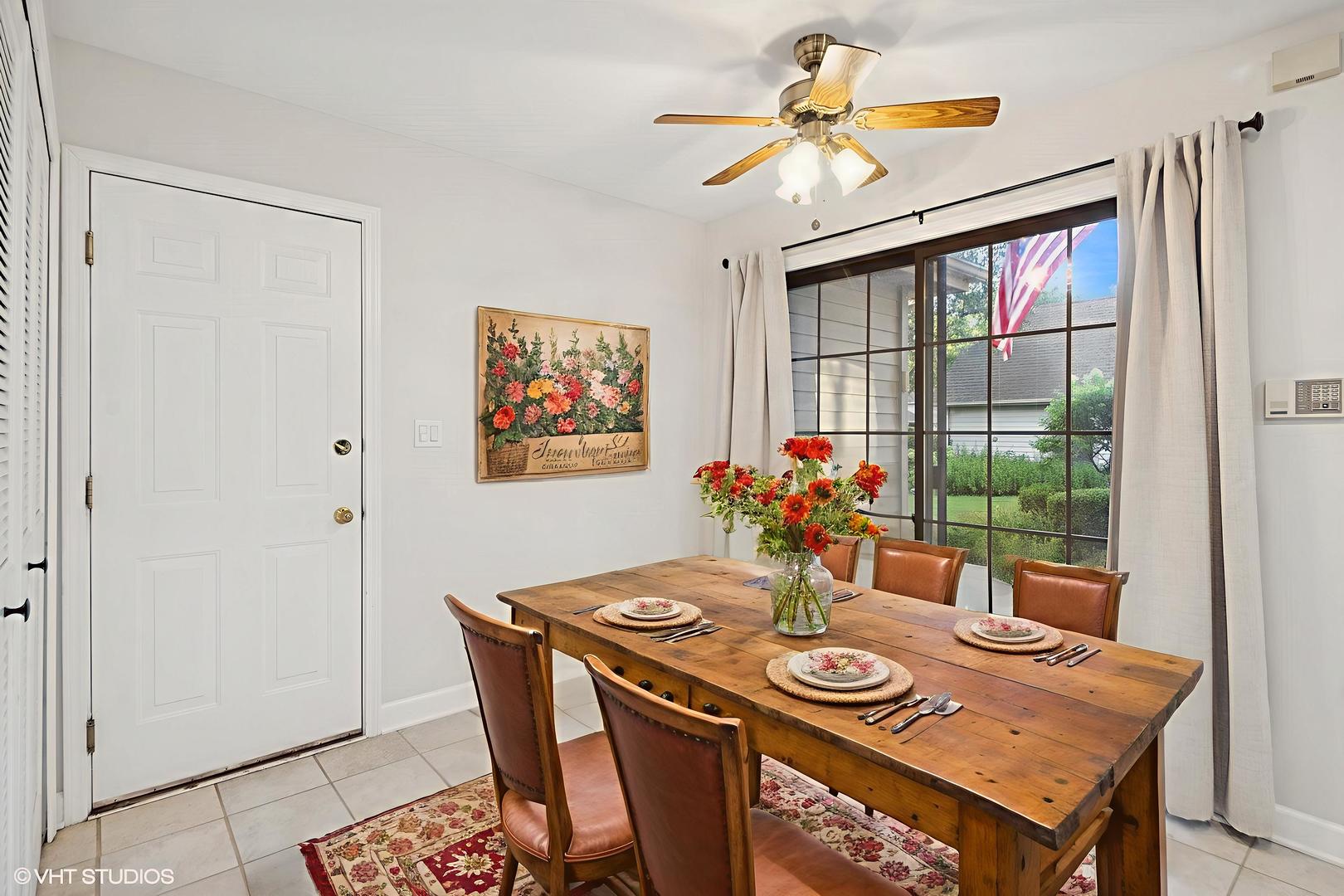 199 Springdale Lane Bloomingdale, IL 60108 - Photo 21 of 70 a view of a dining room with furniture window and outside view